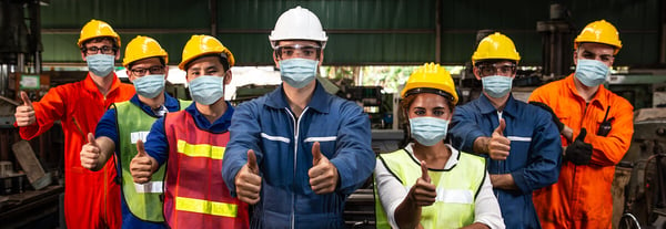 Workplace safety: employees wearing hard hats onsite